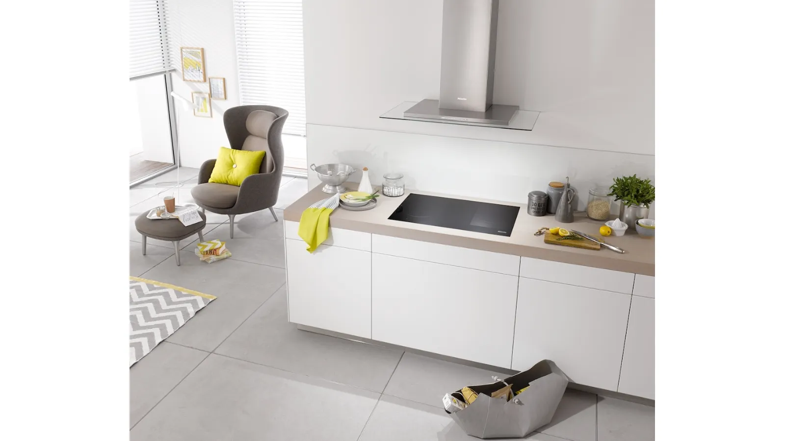 Wall-mounted 5798 W Next Step extractor hood with LED lighting by Miele
