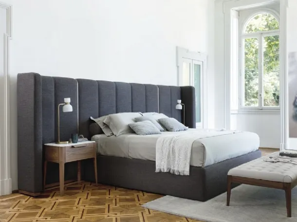 Bed with Aida headboard by Porada