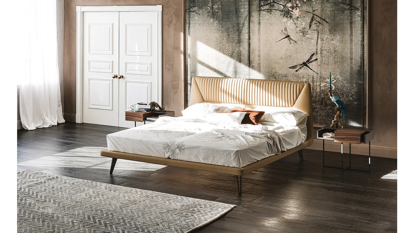 Bed with contoured padded headboard upholstered in Amadeus faux leather by Cattelan Italia