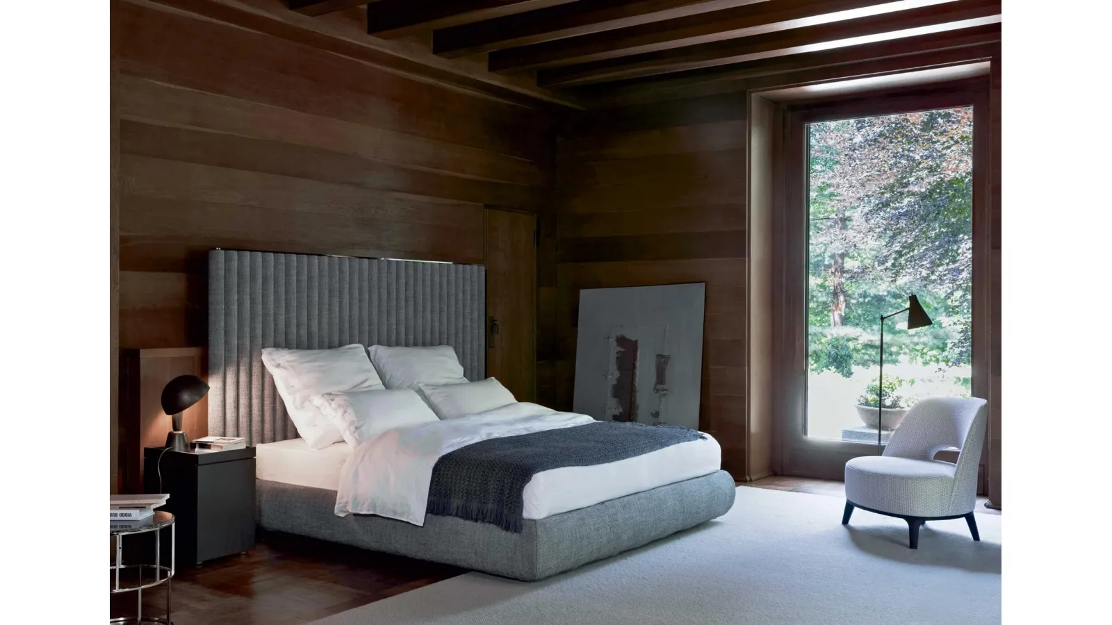 Upholstered fabric bed with Biarritz headboard by Flexform
