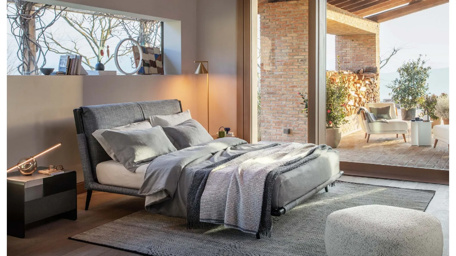 Fabric bed with Gaudì wooden frame by Flou