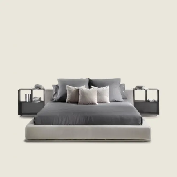 Elegant bed with essential design in Flexform's Groundpiece fabric