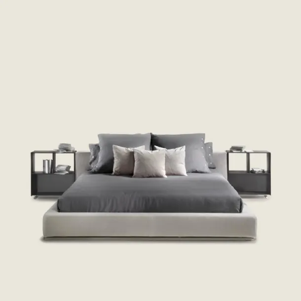Elegant bed with essential design in Flexform's Groundpiece fabric