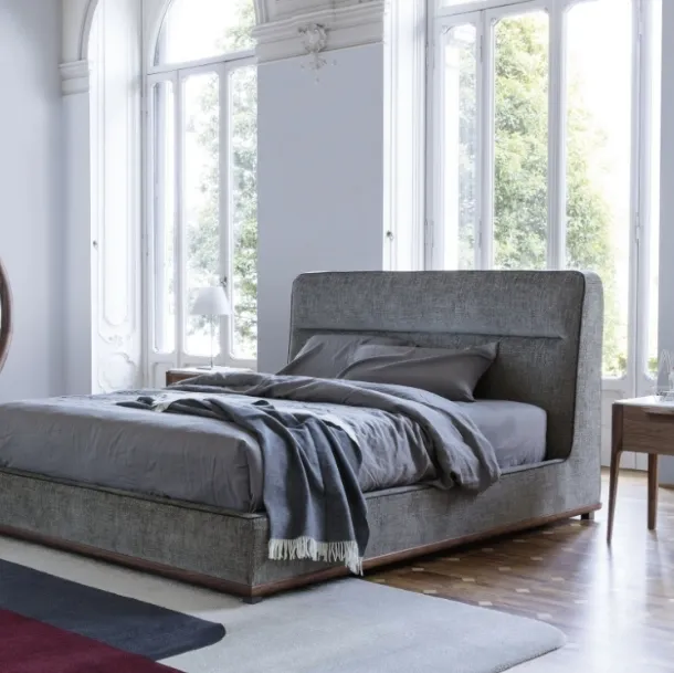 Kirk bed with upholstered fabric by Porada