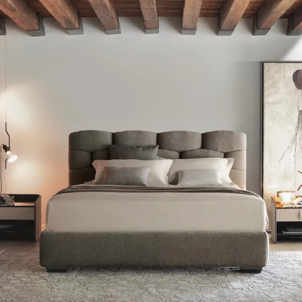 Fabric bed with Majal headboard by Flou