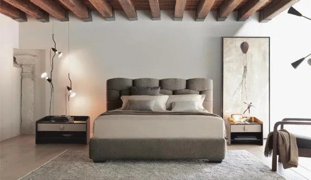 Fabric bed with Majal headboard by Flou