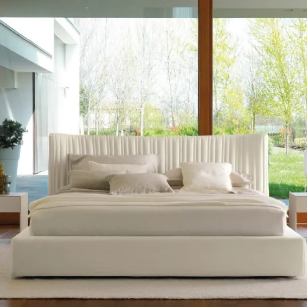 Fabric bed with storage box and sinuous headboard with irregular quilted 