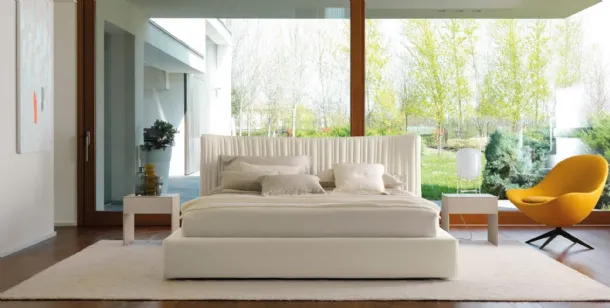 Fabric bed with storage box and sinuous headboard with irregular quilted 