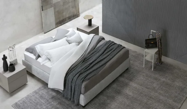 Sommier bed in fabric, simple and versatile with storage by Flou