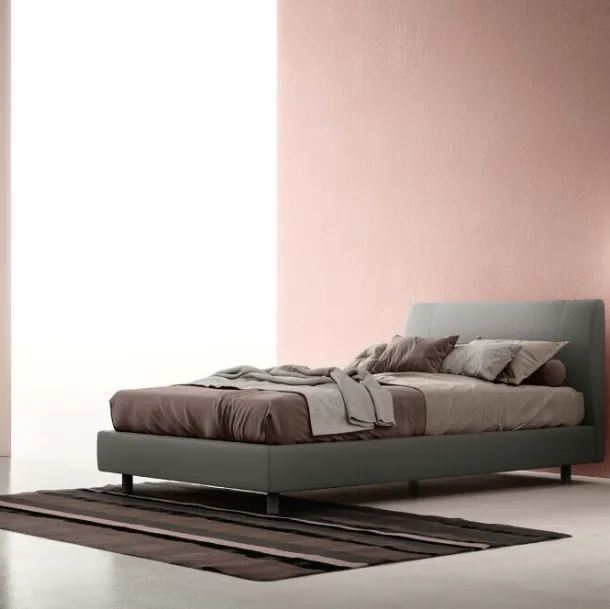 Fabric bed with Spoon headboard by Zalf