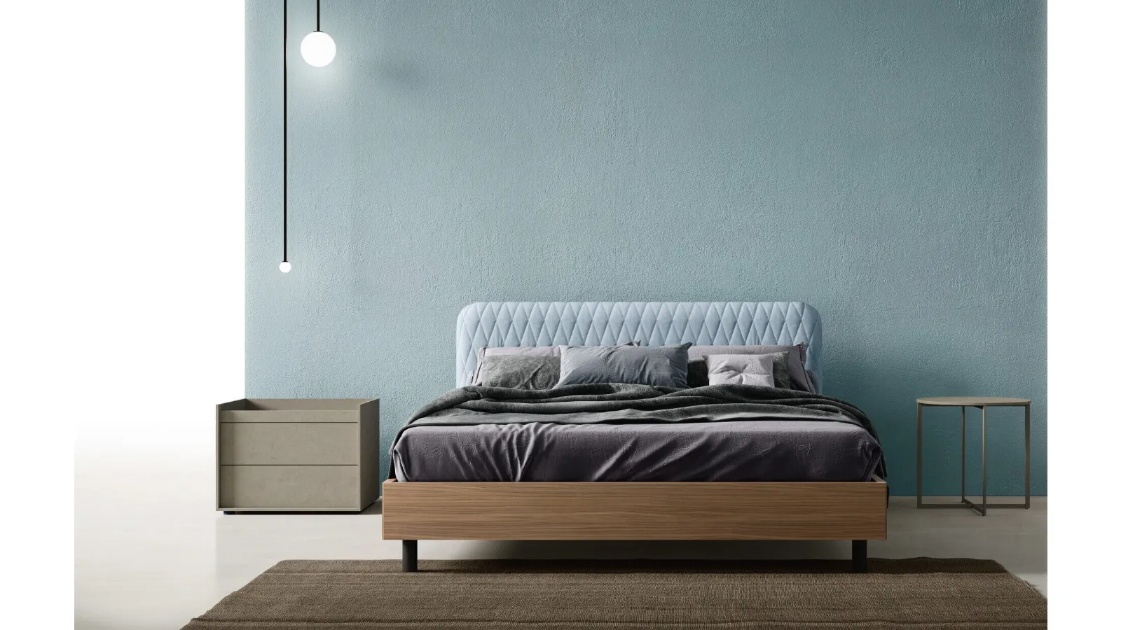 Wing Bed with quilted fabric headboard by Zalf