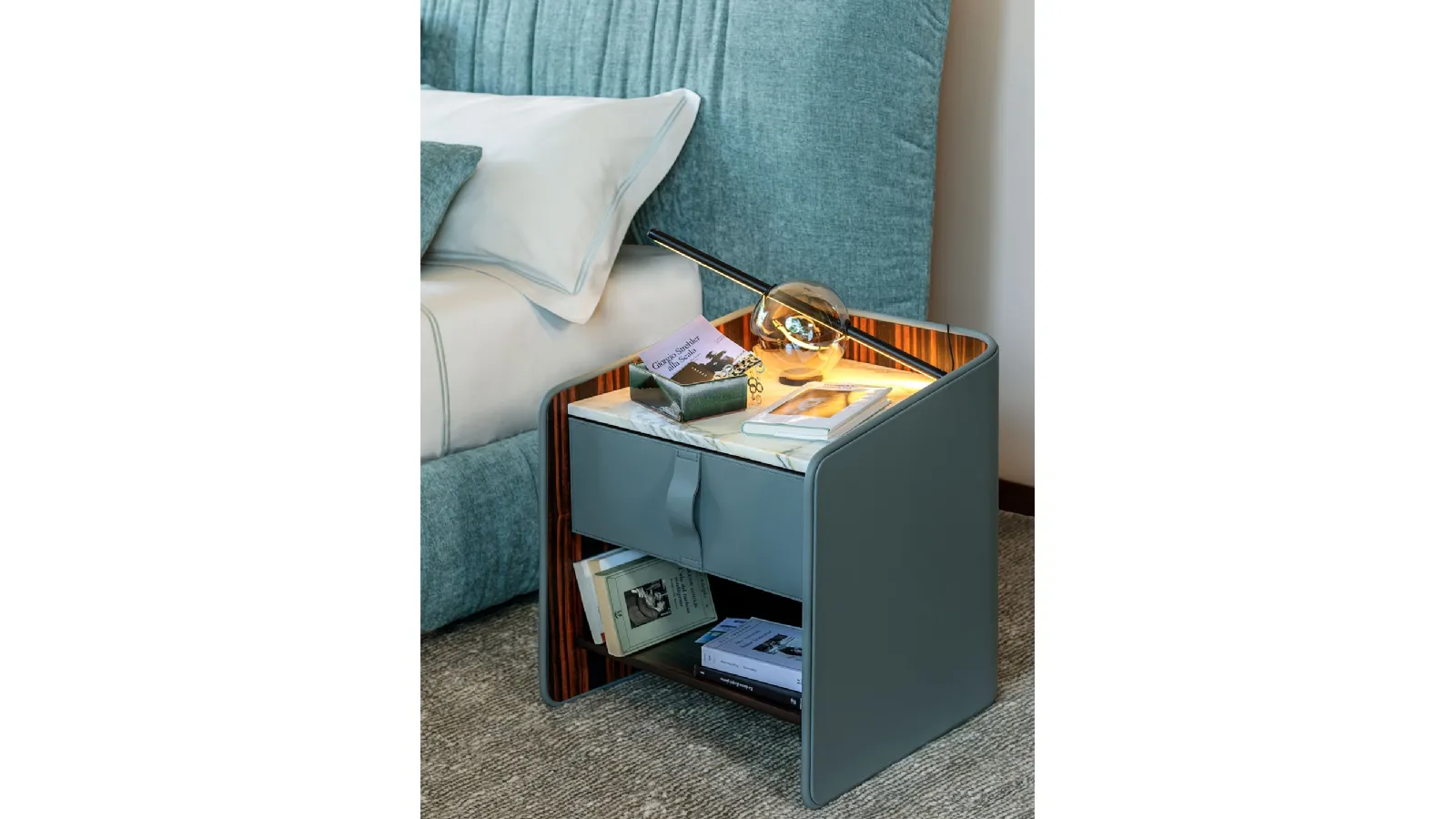 Gentleman bedside table upholstered in leather by Flou