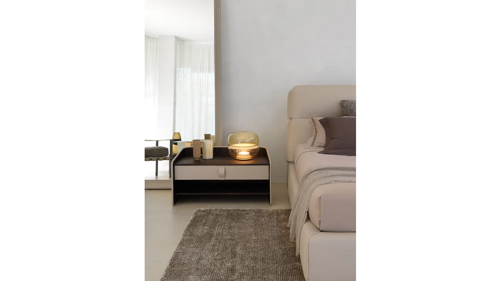 Gentleman bedside table upholstered in leather by Flou