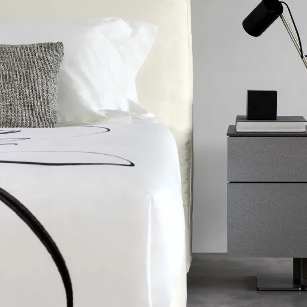 Juta High Nightstand with matte lacquered finish and central metal leg by Flou