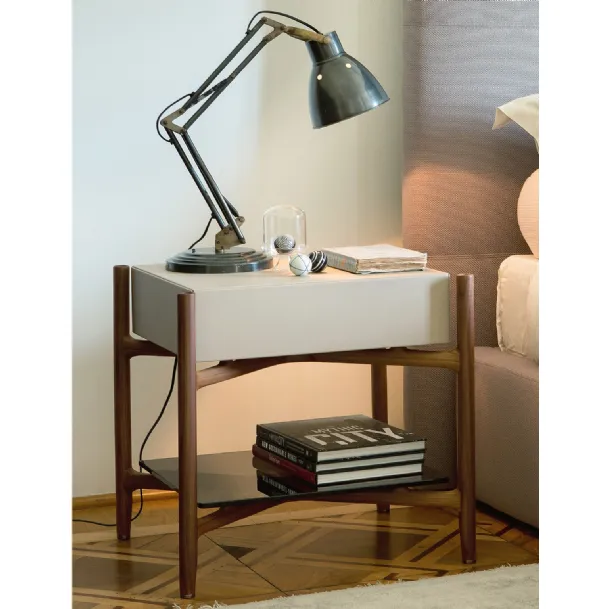 Regent bedside table in wood covered with leather by Porada