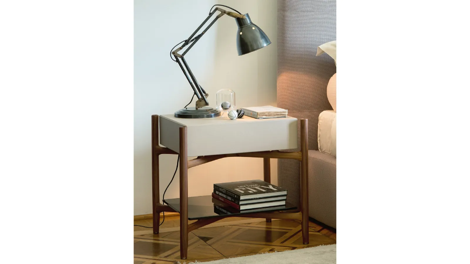 Regent bedside table in wood covered with leather by Porada