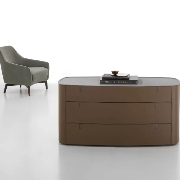 Round chest upholstered in leather with an acrylic stone top by Alivar