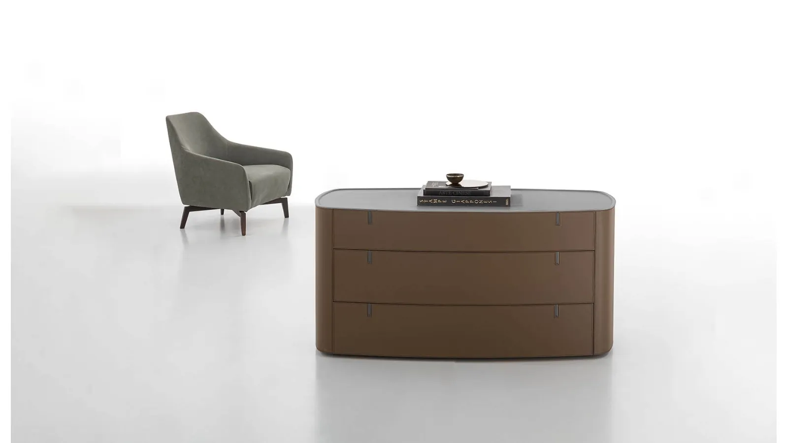 Round chest upholstered in leather with an acrylic stone top by Alivar