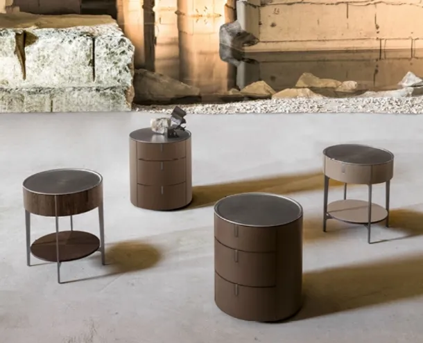 Round bedside table upholstered in leather with a steel top by Alivardi Alivar
