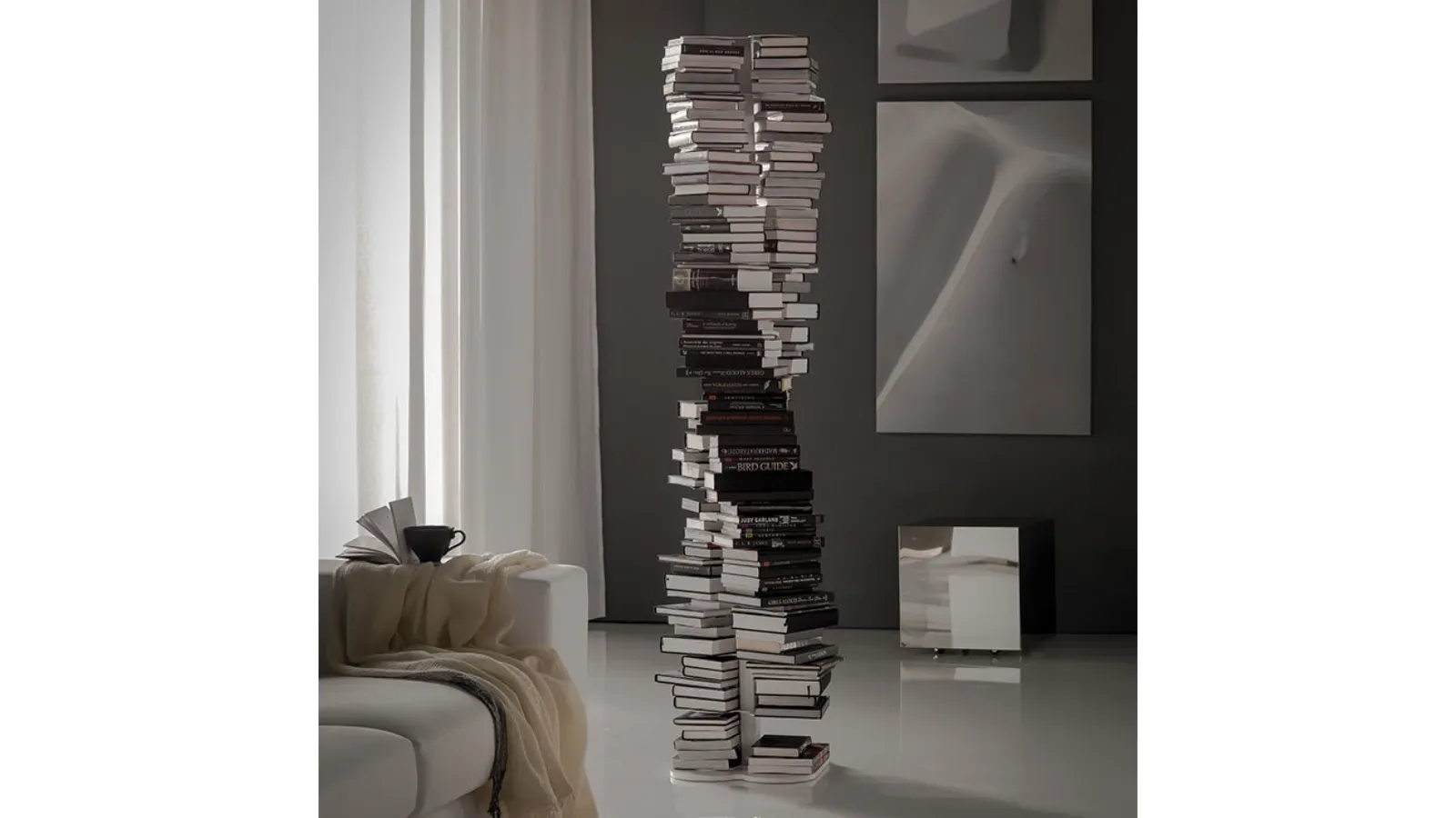 Self-supporting Dna column design bookshelf with thirteen shelves in painted steel by Cattelan
