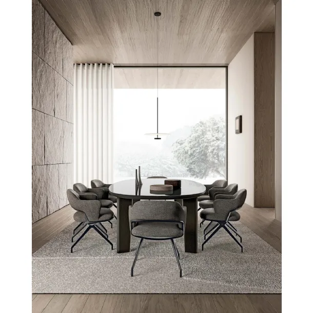Alma upholstered fabric chair by Flexform