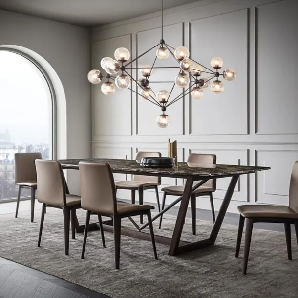Doris Chair with leather-covered shell and wooden legs by Giellesse