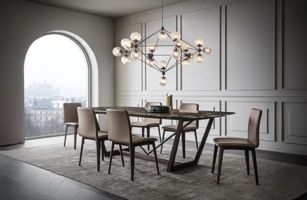 Doris Chair with leather-covered shell and wooden legs by Giellesse