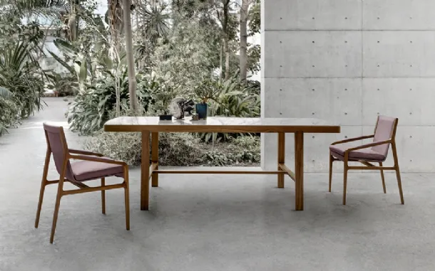 Ester chair upholstered in leather with a solid wood frame by Alivar