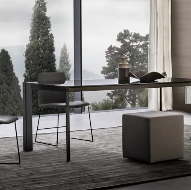 Kell chair in fabric with lacquered metal base by Giellesse
