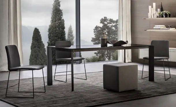 Kell chair in fabric with lacquered metal base by Giellesse