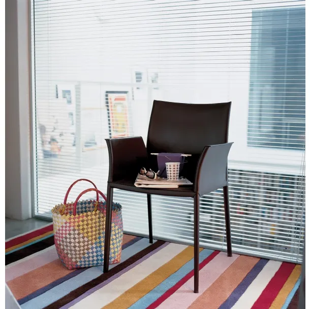 Chair with aluminum structure upholstered in leather with Lea armrests by Zanotta