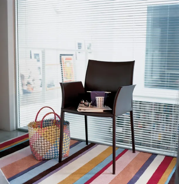 Chair with aluminum structure upholstered in leather with Lea armrests by Zanotta