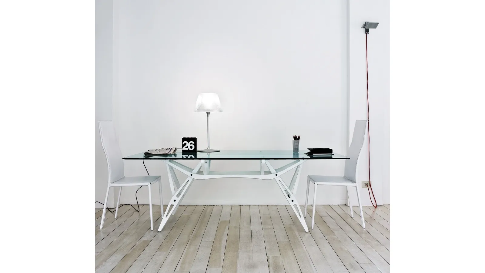 High-back chair upholstered in white leather with an aluminum structure by Zanotta