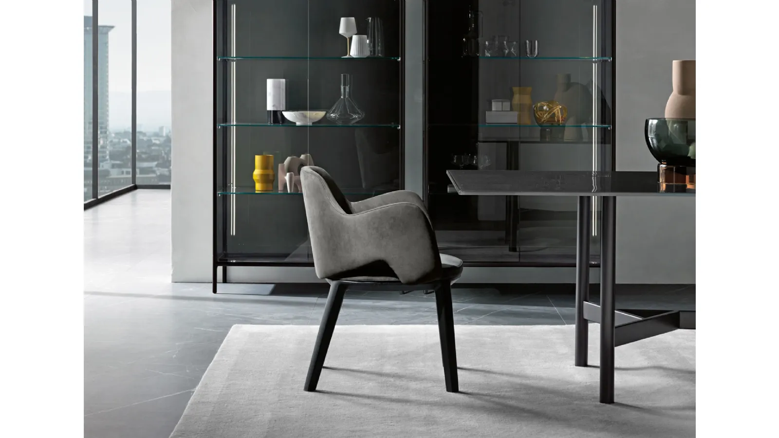 Newton chair upholstered in Nubuck leather with a solid Fiam wood frame