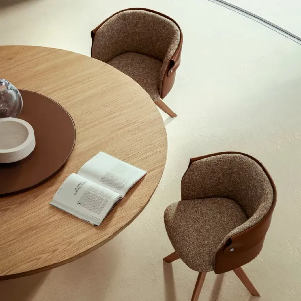 Ozzy chair in fabric and leather with wooden legs by Flexform