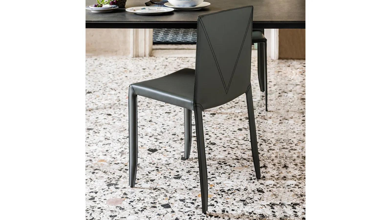 Ultra-lightweight and practical chair upholstered in Piuma leather by Cattelan Italia
