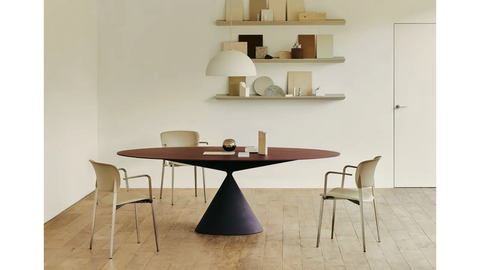 Stackable Ply chair upholstered in leather by Desalto