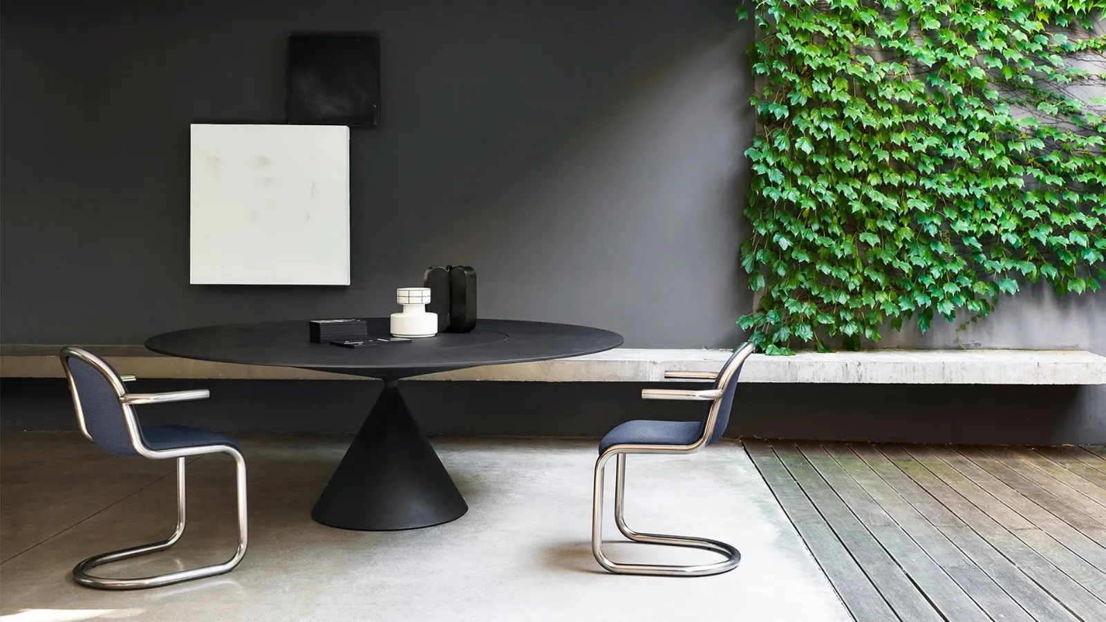 Armchair Strong with a bent steel tube frame and upholstered seat covered in Desalto fabric