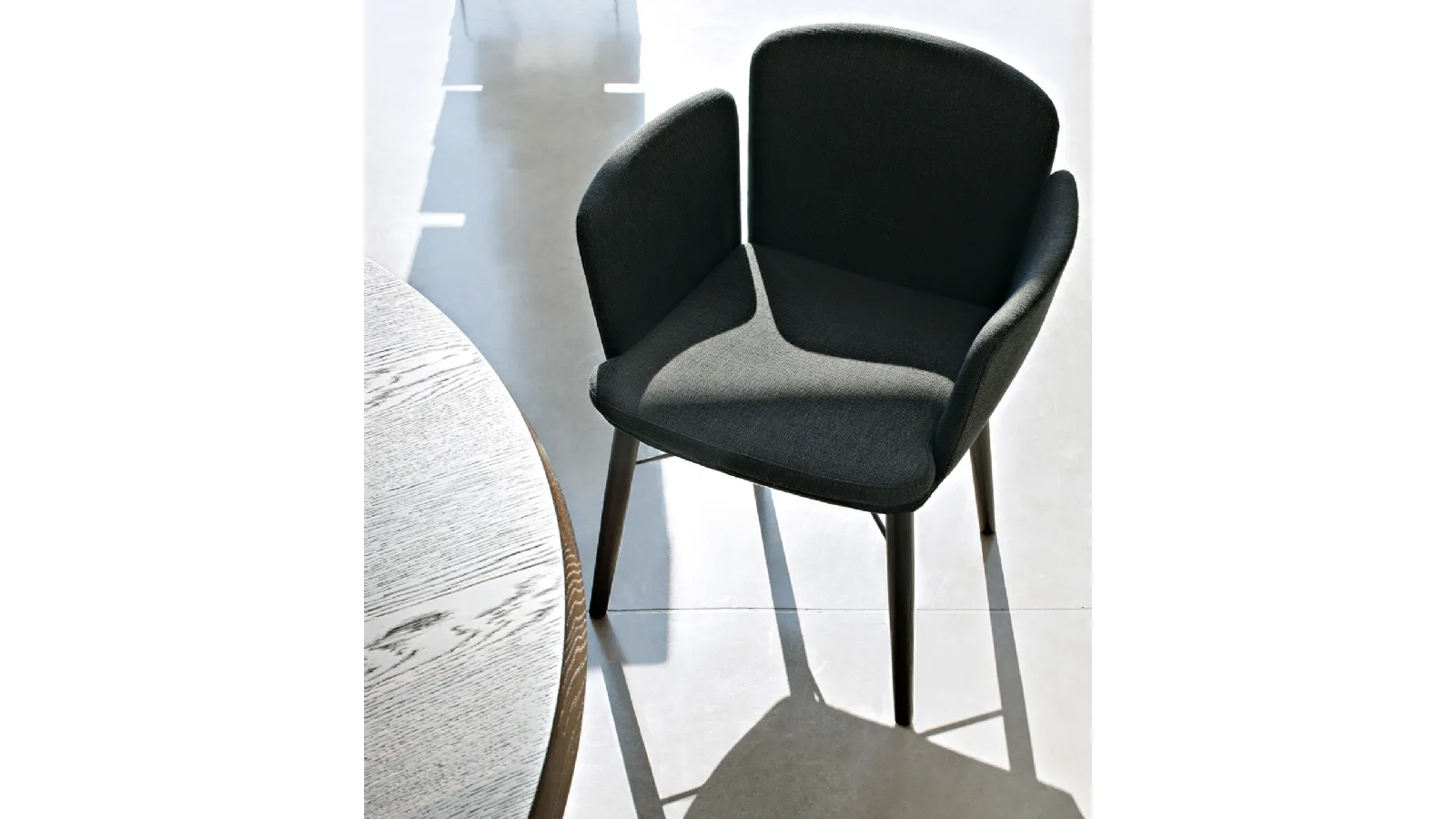 Tabby fabric chair by Lema