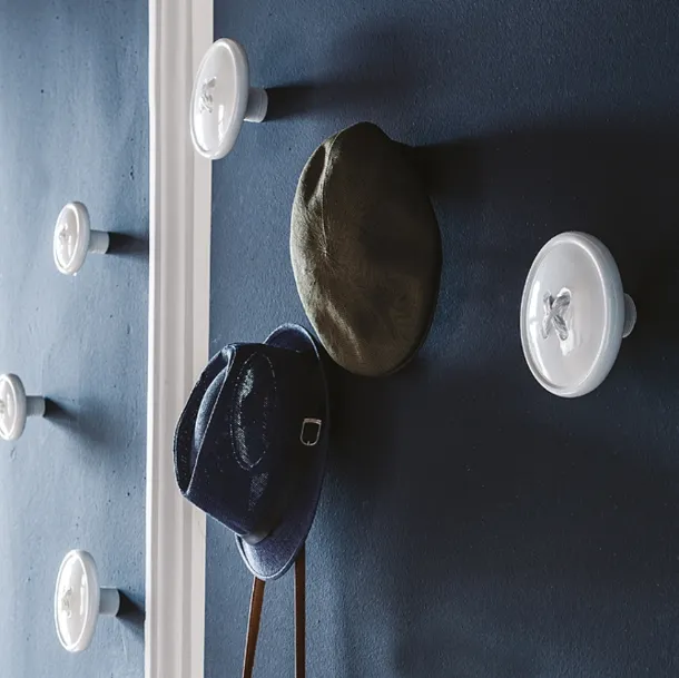 Coat Hanger Button in rigid polyurethane painted mother-of-pearl white by Cattelan Italia