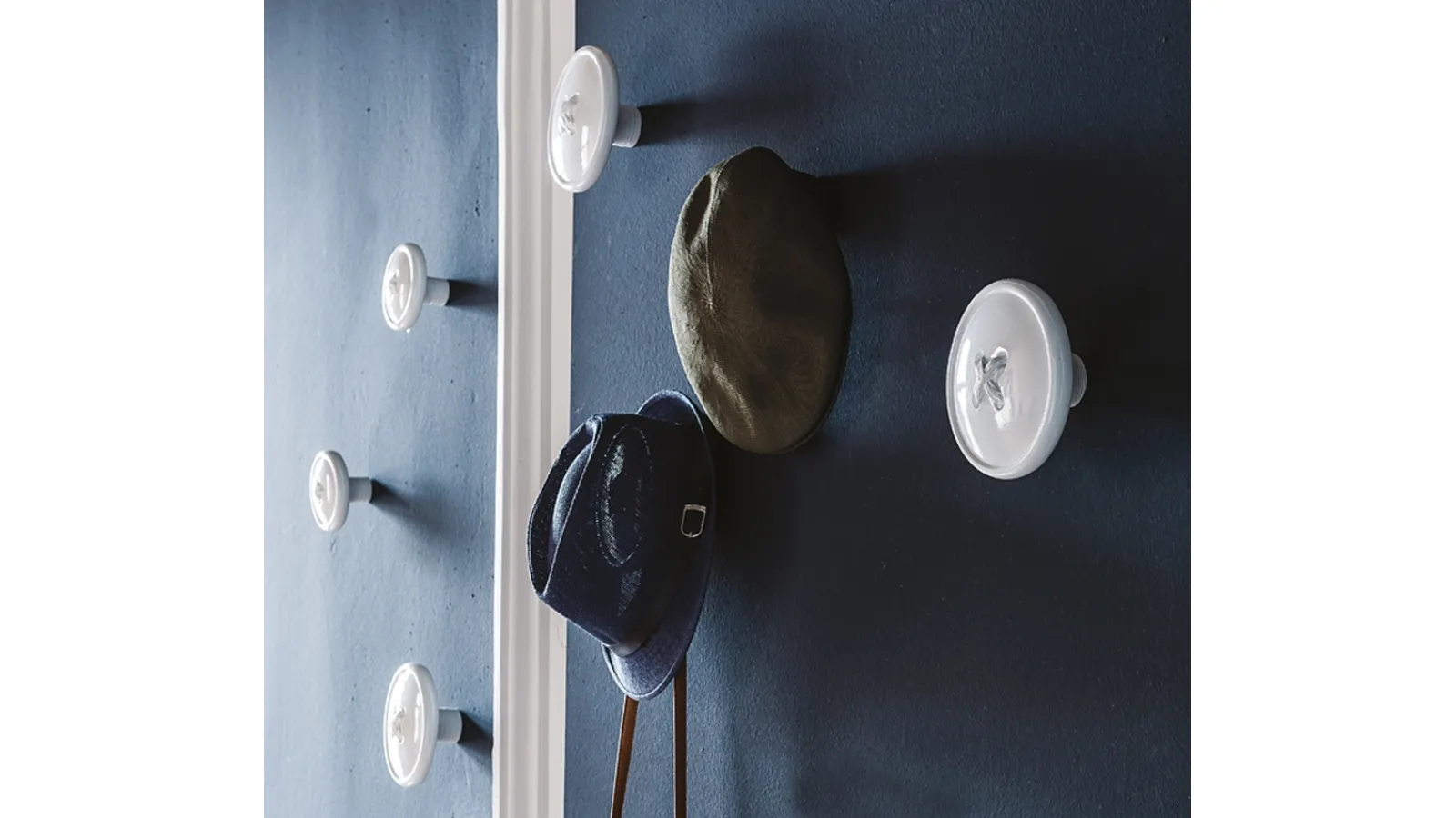Coat Hanger Button in rigid polyurethane painted mother-of-pearl white by Cattelan Italia