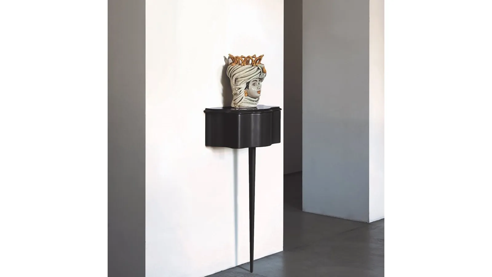 Carlino CM wall-mounted storage coffee table in black lacquered wood by Zanotta