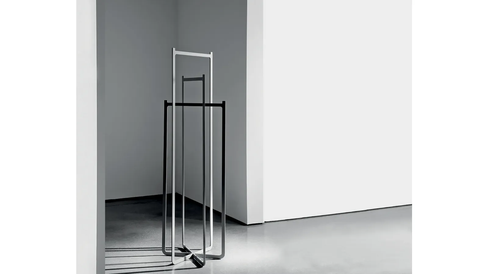 Clip coat rack made of laser-cut, welded, and painted metal sheet by Sovet