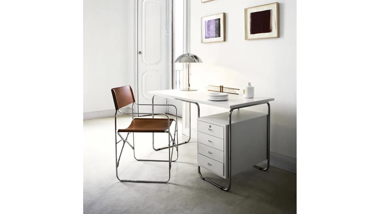 Desk with leather-covered top and Comacina steel structure by Zanotta