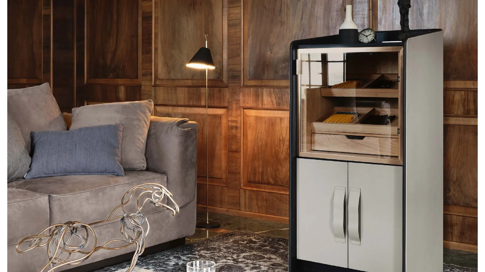 Gentleman cigar storage cabinet in leather-covered wood by Flou