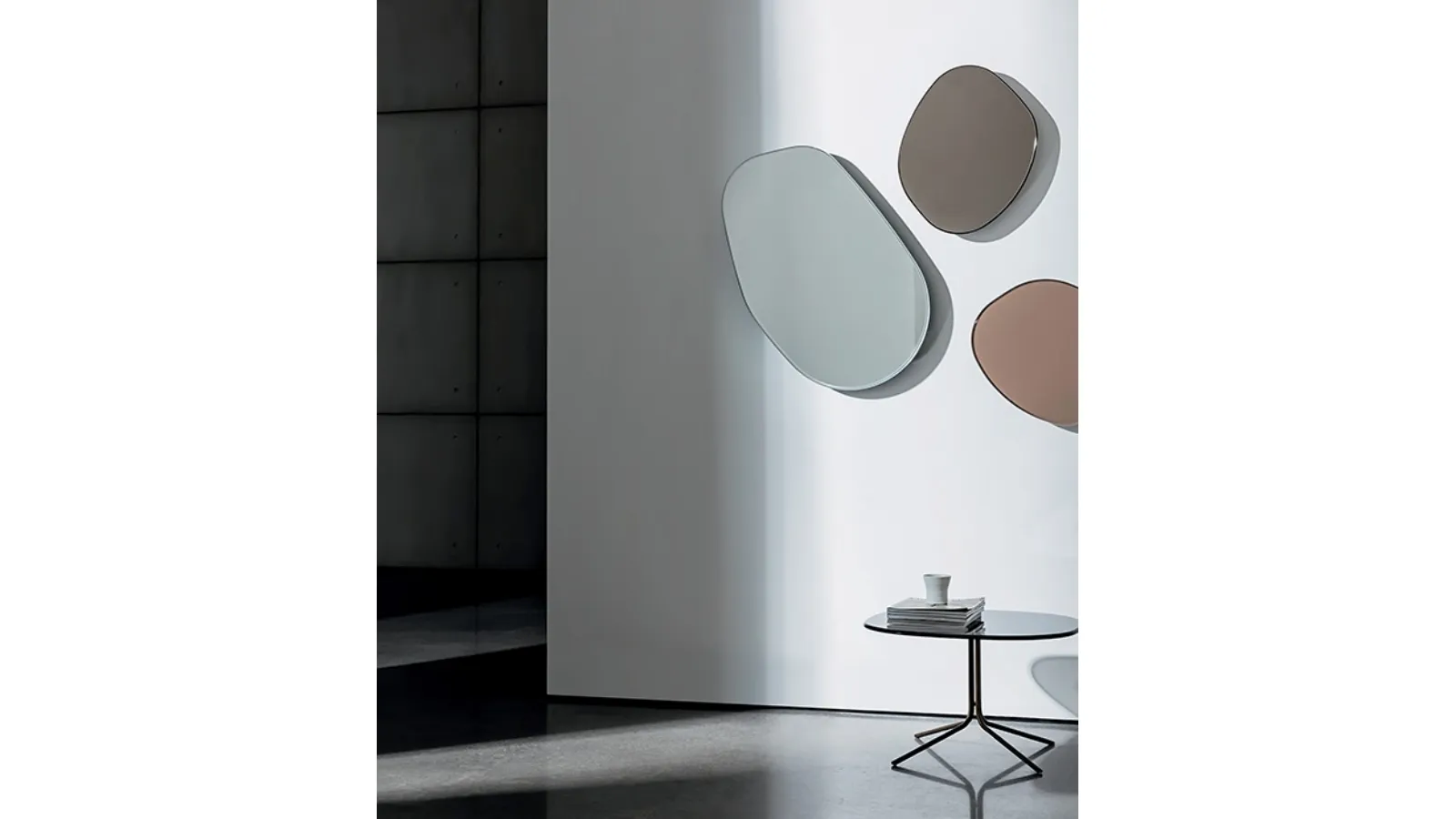 Irregular mirror that can be rotated Dew Drops in extra-clear, bronze, or smoked glass by Sovet