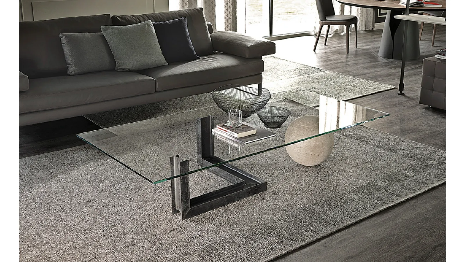 Glass coffee table with steel base and Levante travertine sphere by Cattelan Italia