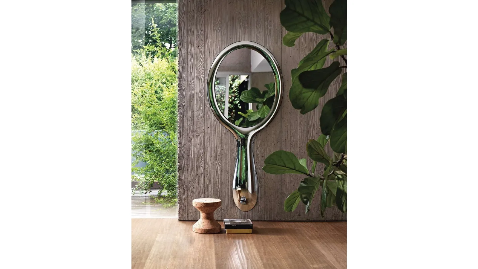 Lollipop Mirror with a retro-silvered fused glass frame by Fiam