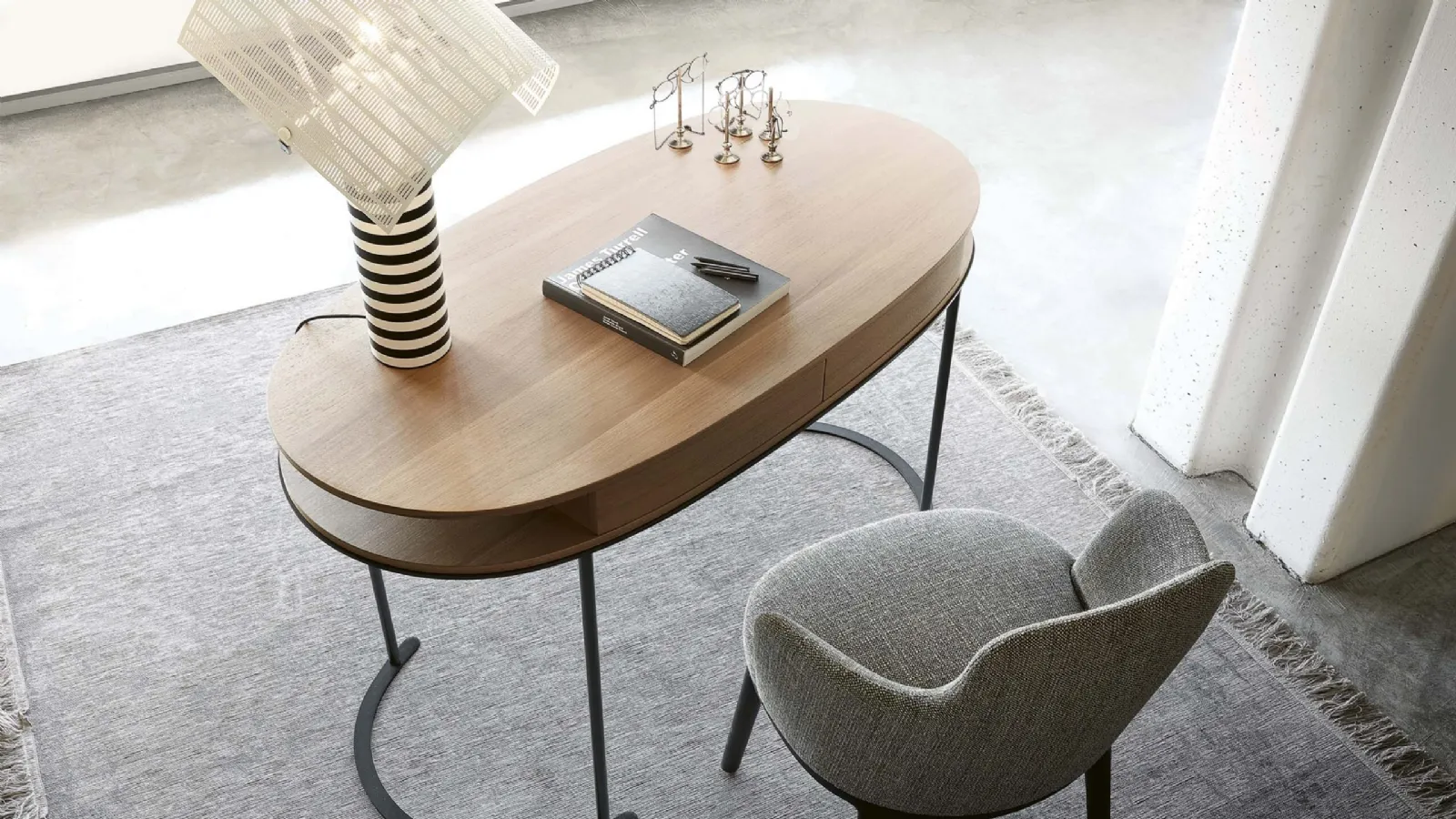 Ortis desk by Lema with metal frame and oval wooden top with drawers