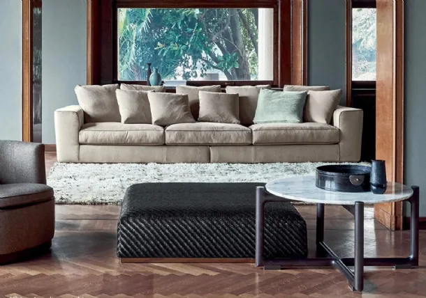 Carmen pouf in braided leather with metal base by Flexform